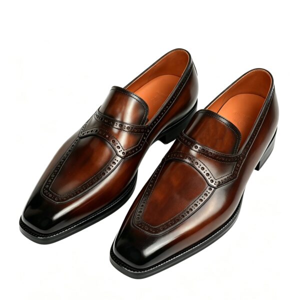 GRANDMARK penny loafer men's dress shoes, three-quarter view, white background