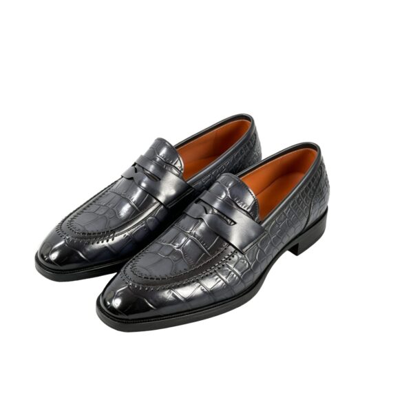 GRANDMARK croc-embossed penny loafer men's dress shoes, three-quarter view, white background