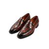 GRANDMARK croc-embossed penny loafer men's dress shoes, three-quarter view, white background