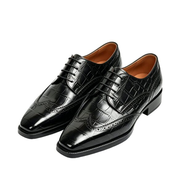 GRANDMARK croc-embossed wingtip oxford men's dress shoes, three-quarter view, white background