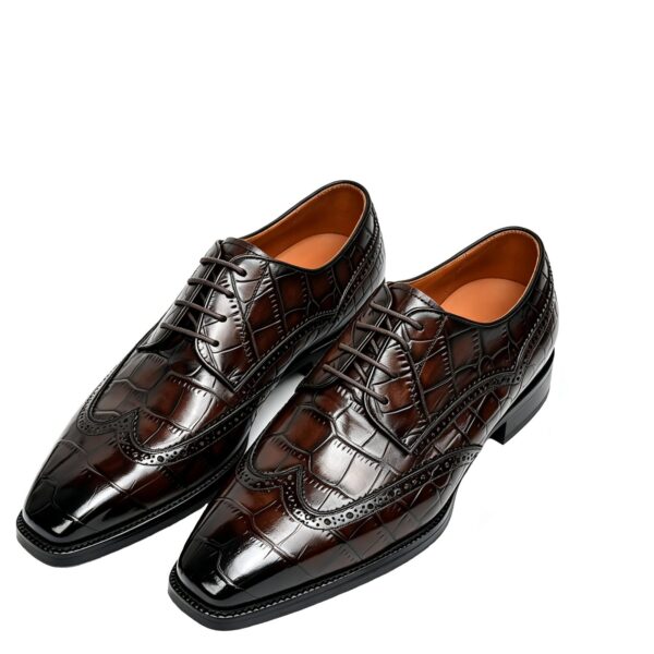 GRANDMARK croc-embossed wingtip oxford men's dress shoes, three-quarter view, white background