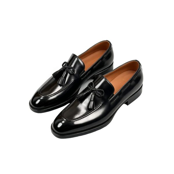 GRANDMARK braided-knot tassel loafer men's dress shoes, three-quarter view, white background