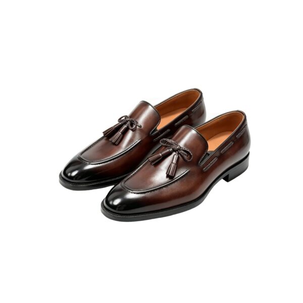 GRANDMARK braided-knot tassel loafer men's dress shoes, three-quarter view, white background
