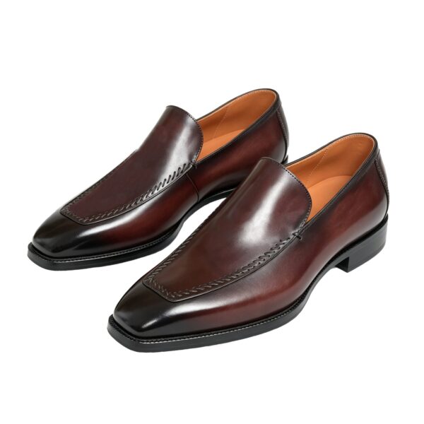 GRANDMARK venetian loafer men's dress shoes, three-quarter view, white background