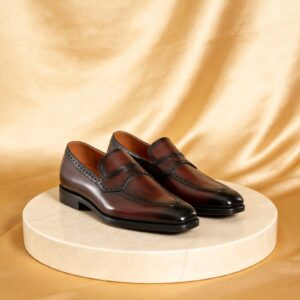 Brogue-Trim Penny Loafer men's formal leather dress shoe, GRANDMARK promotional photo Brogue-Trim Penny Loafer men's formal leather dress shoe, GRANDMARK promotional photo