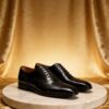 Polished Wingtip Oxford men's formal leather dress shoe, GRANDMARK promotional photo